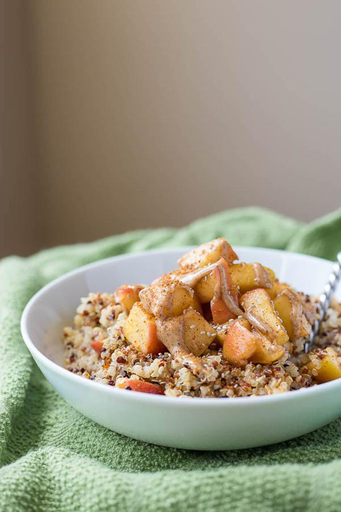 This Caramelized Peach Quinoa Breakfast Bowl is packed with protein and makes a great summer breakfast.