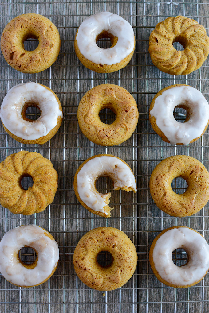 easy baked pumpkin mini donuts with a powdered sugar glaze