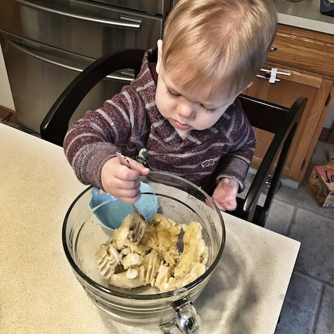 Cooking with Kids, Toddler Meltdowns and Workouts 1 toddler in the kitchen mashing banana