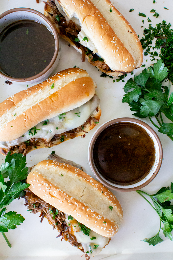 crockpot French dip sandwich with au jus dipping sauce